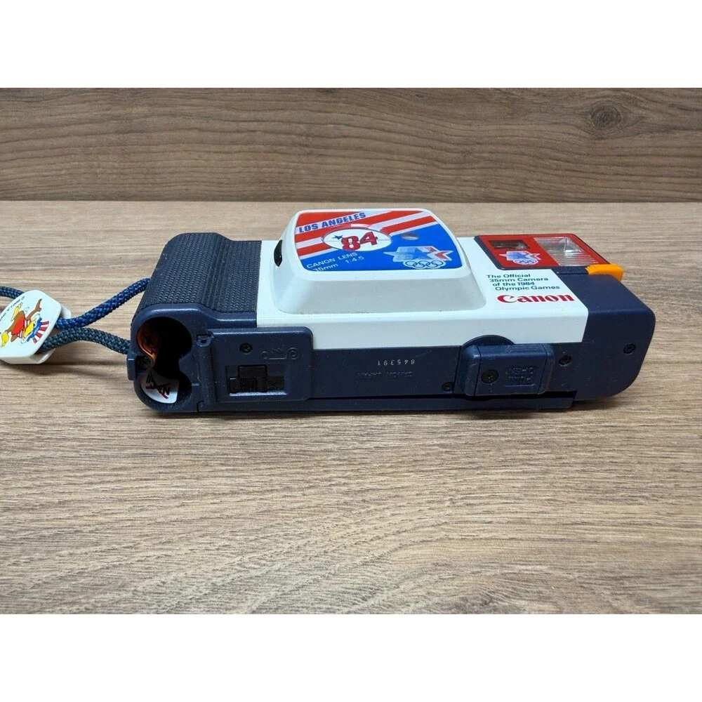 Pair of Canon Snappy '84 35mm Film Cameras LA Olympic 1984 Japan